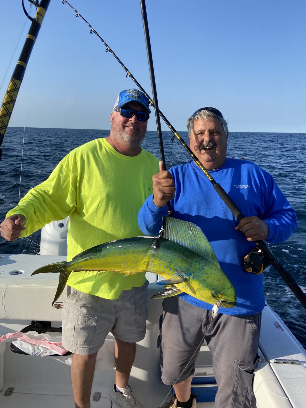 Angler holding a mahi mahi